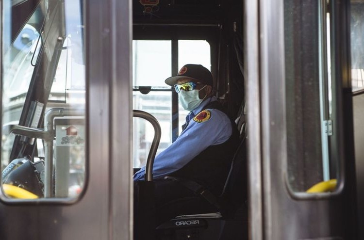 wearing a mask in a bus